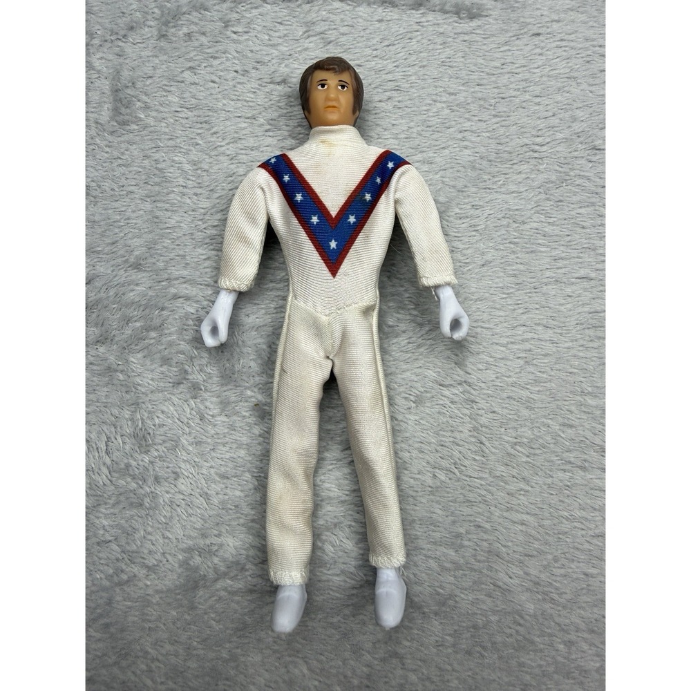 Vintage 7 in Action Figure White Jumpsuit Red/Blue V Star Chest Design